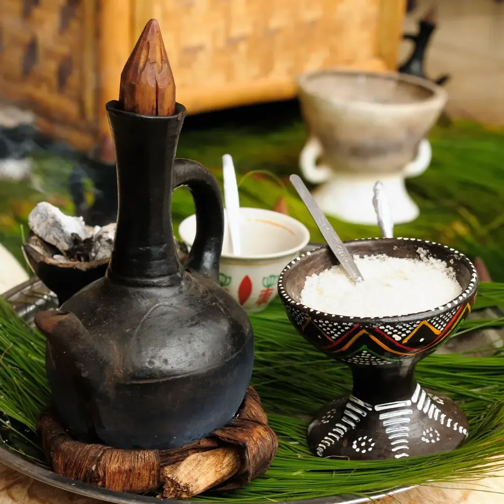 Ethiopian coffee pot with a sugar bowl during a ceremony