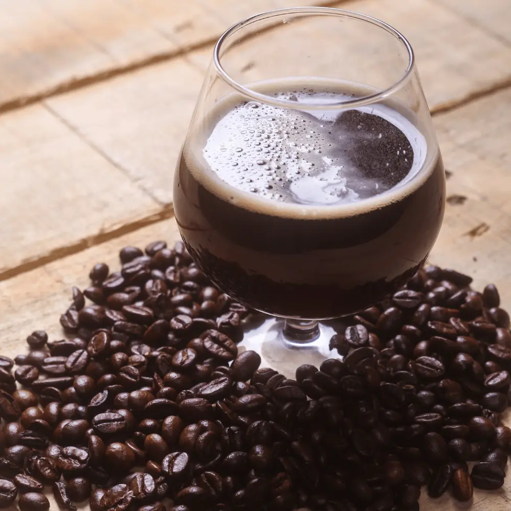 A Glass of Coffee Beer with Coffee Beans