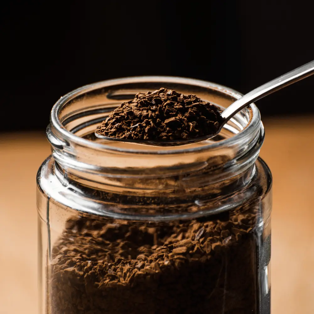 gluten free instant coffee in a clear jar with a spoon