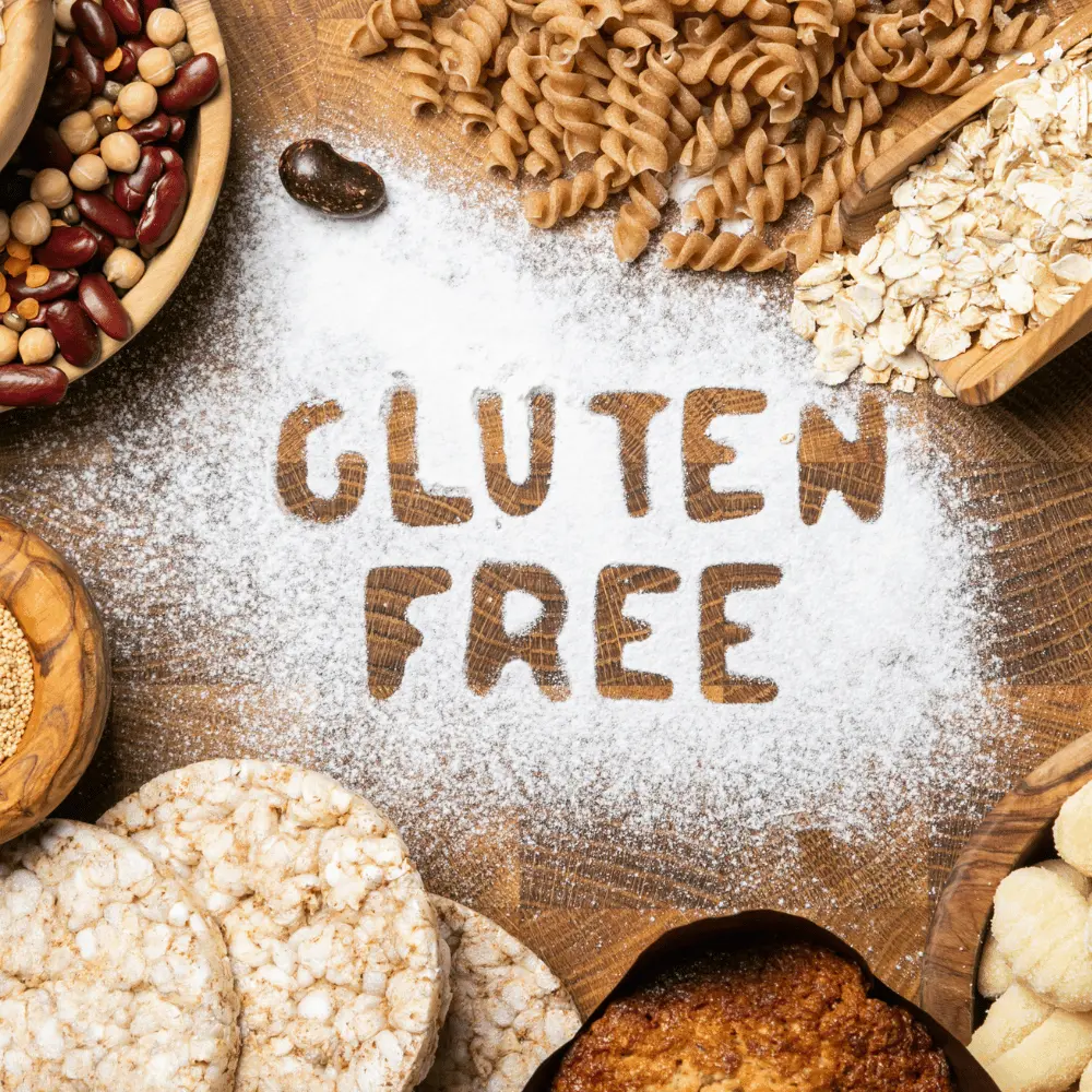gluten free written in flour with grains around it