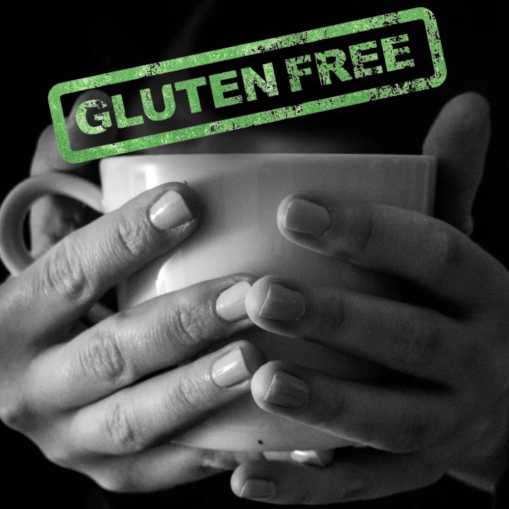 hands holding a coffee mug and wondering if coffee is gluten-free