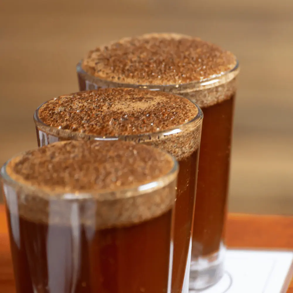 three americano coffees in a coffee flight