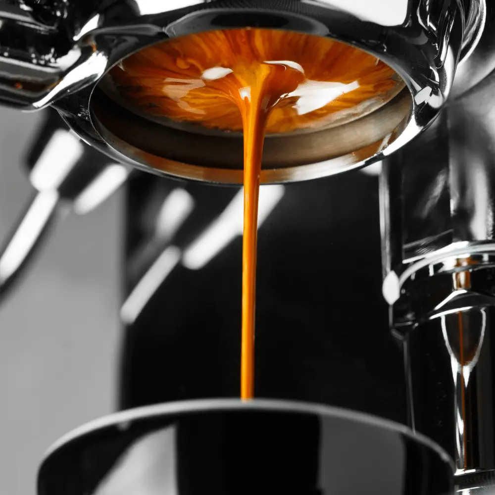 espresso machine pressing a shot of espresso for a red eye coffee