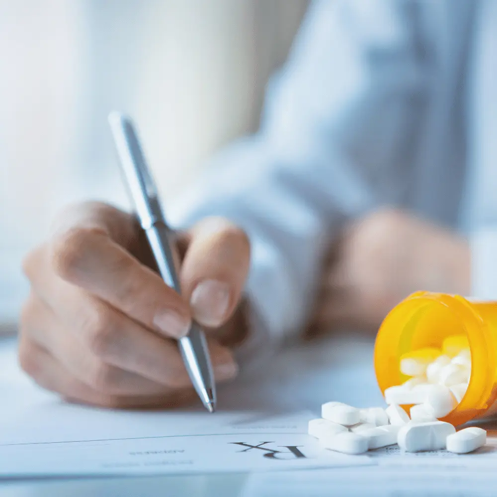 a doctor prescribing medication for wisdom tooth removal