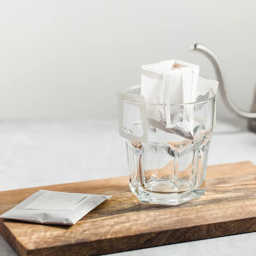 preparing a pour over coffee bag for brewing