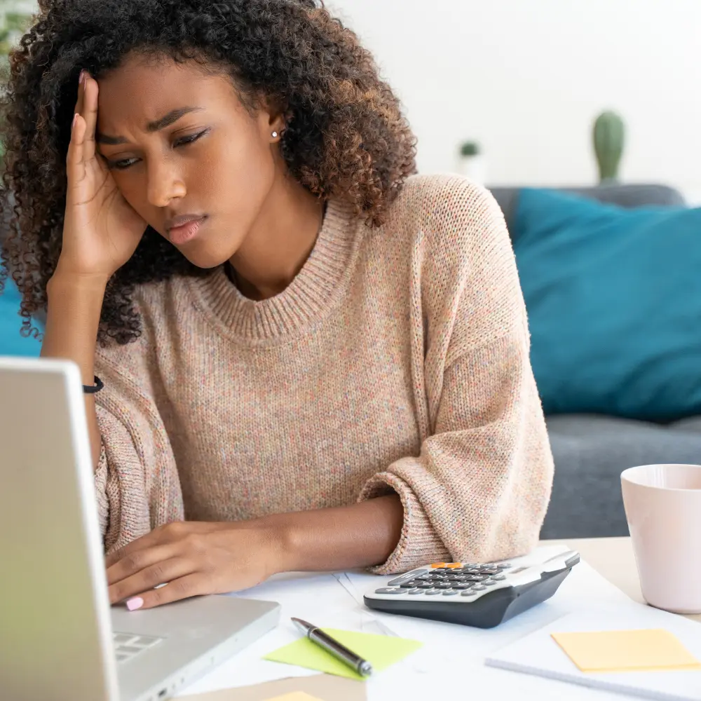 a woman trying to focus on work