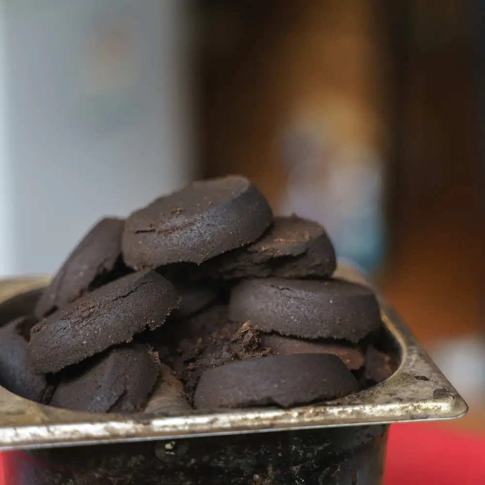 used coffee grounds in pucks