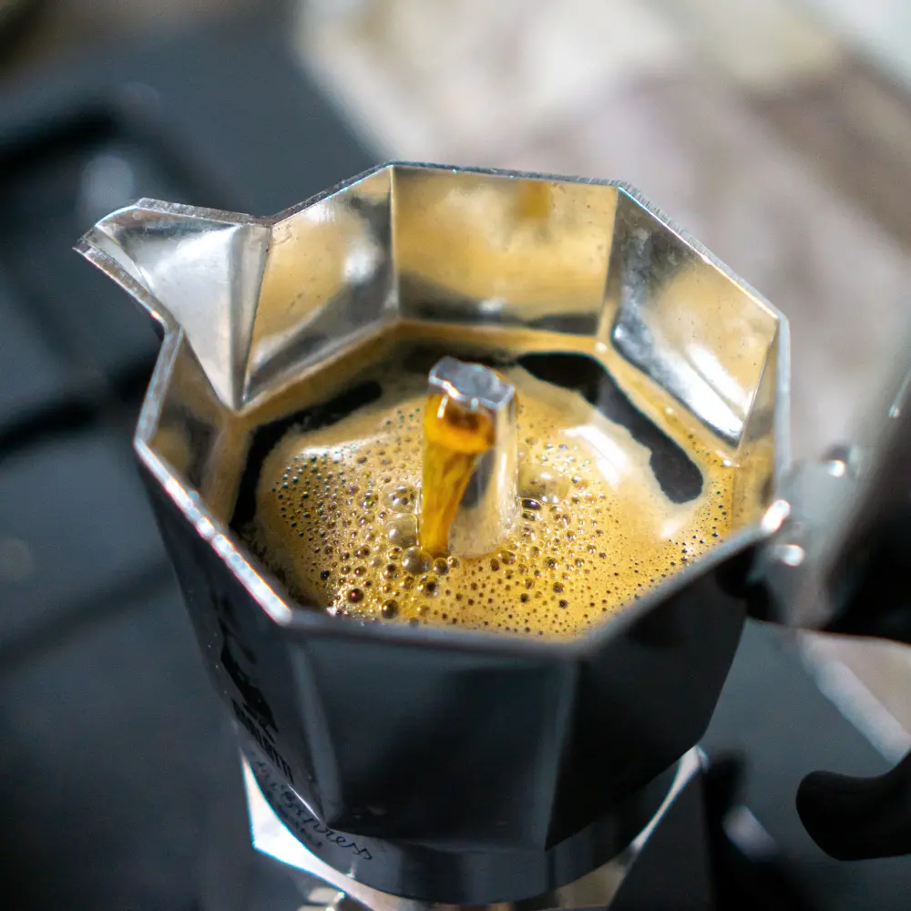 moka pot brewing coffee