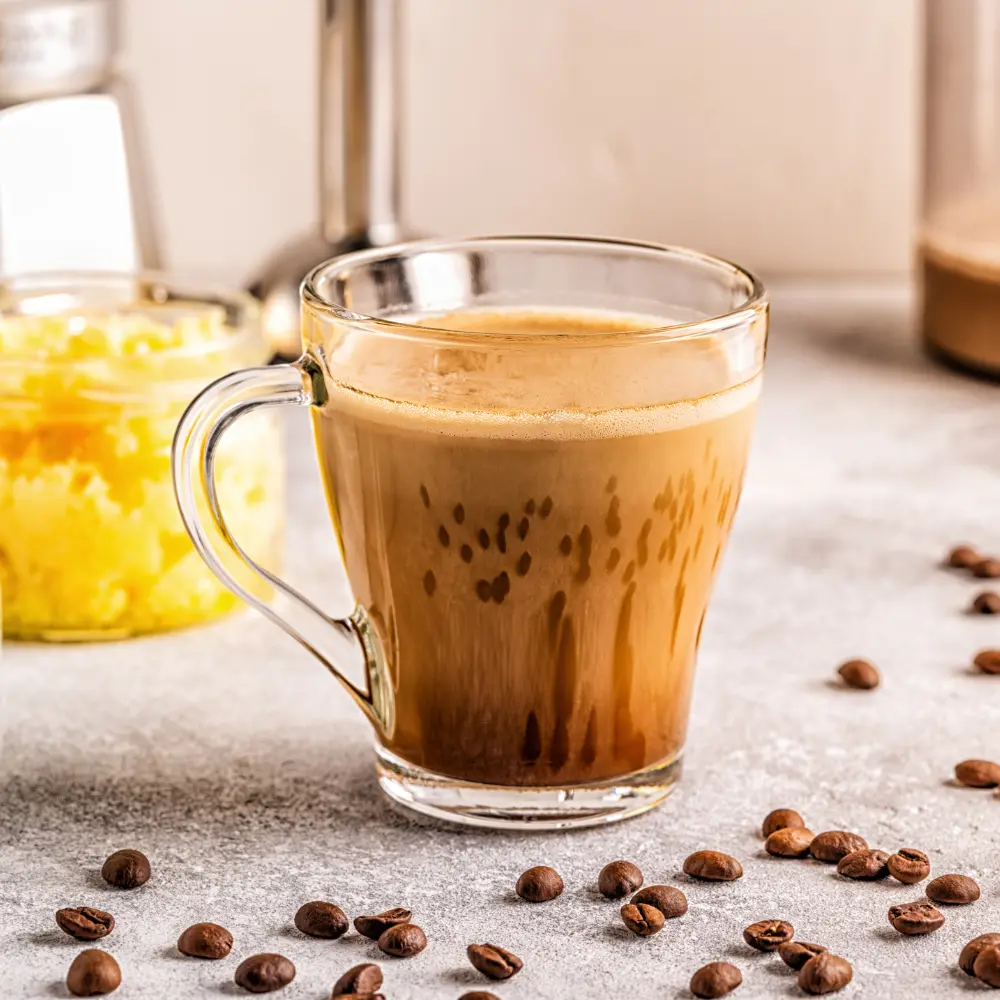 butter coffee in a glass mug