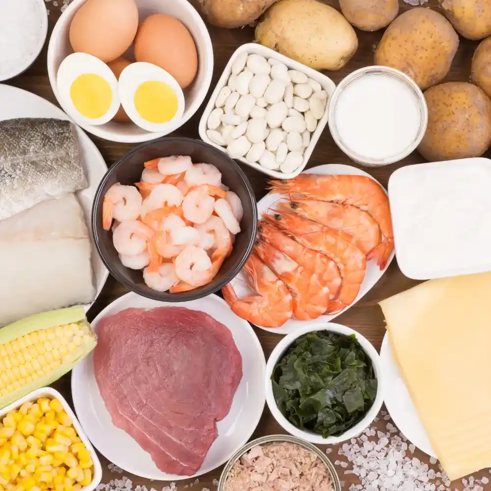 various healthy foods, eggs, salmon, lean beefs and shrimp