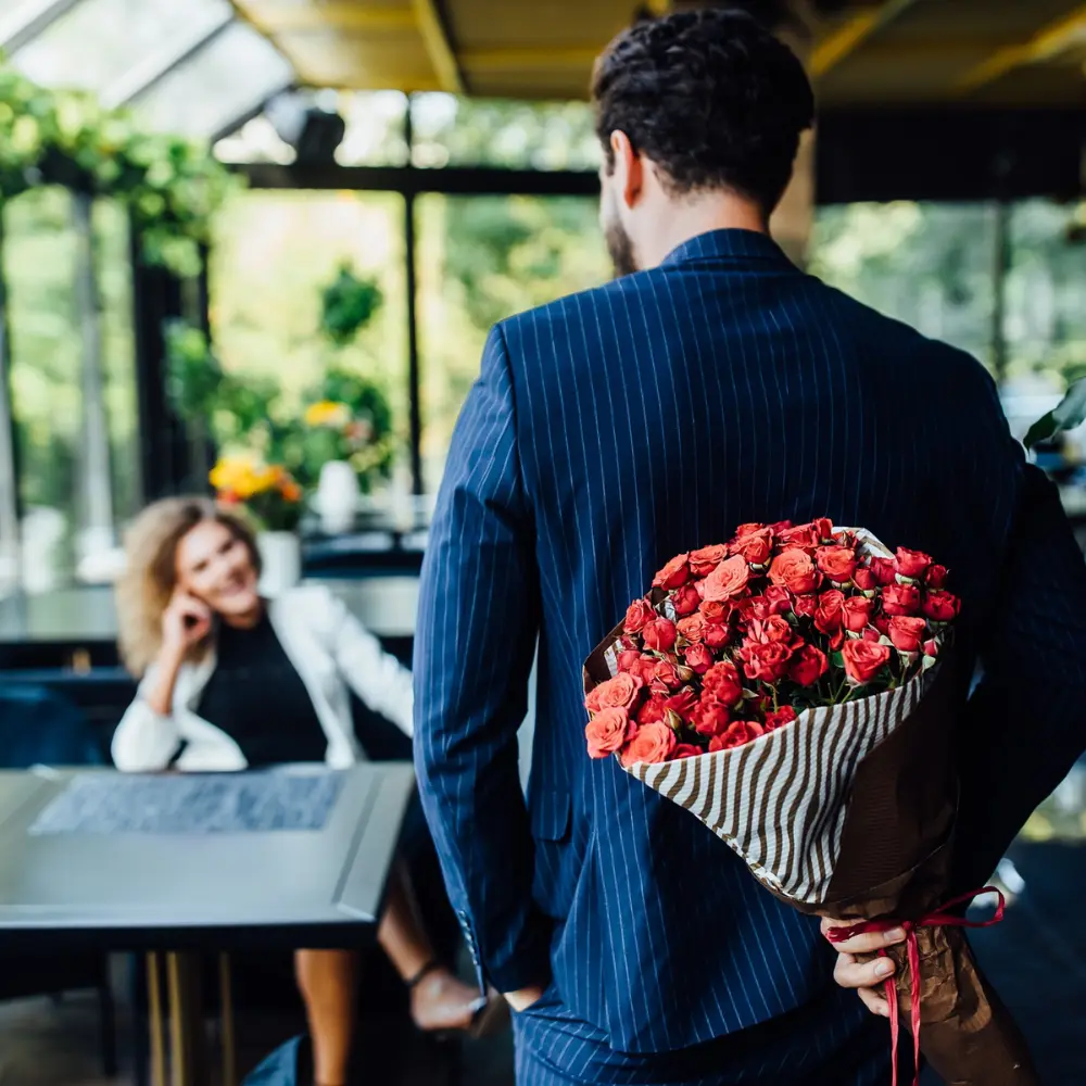 man showing up with flowers on a second date