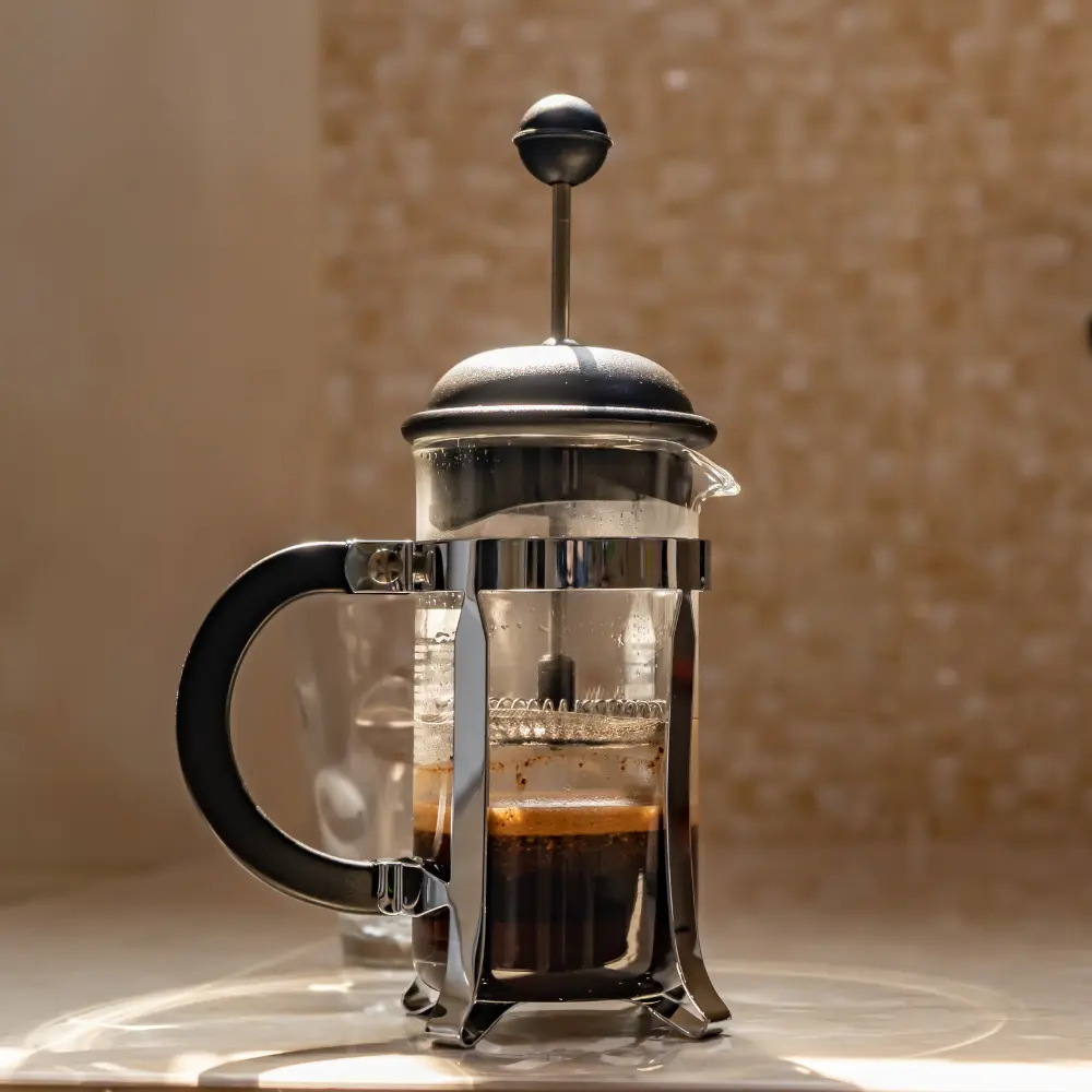 a classic french press coffee maker - bodum model