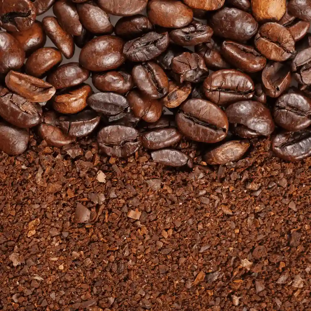 whole coffee beans mixed with ground coffee beans