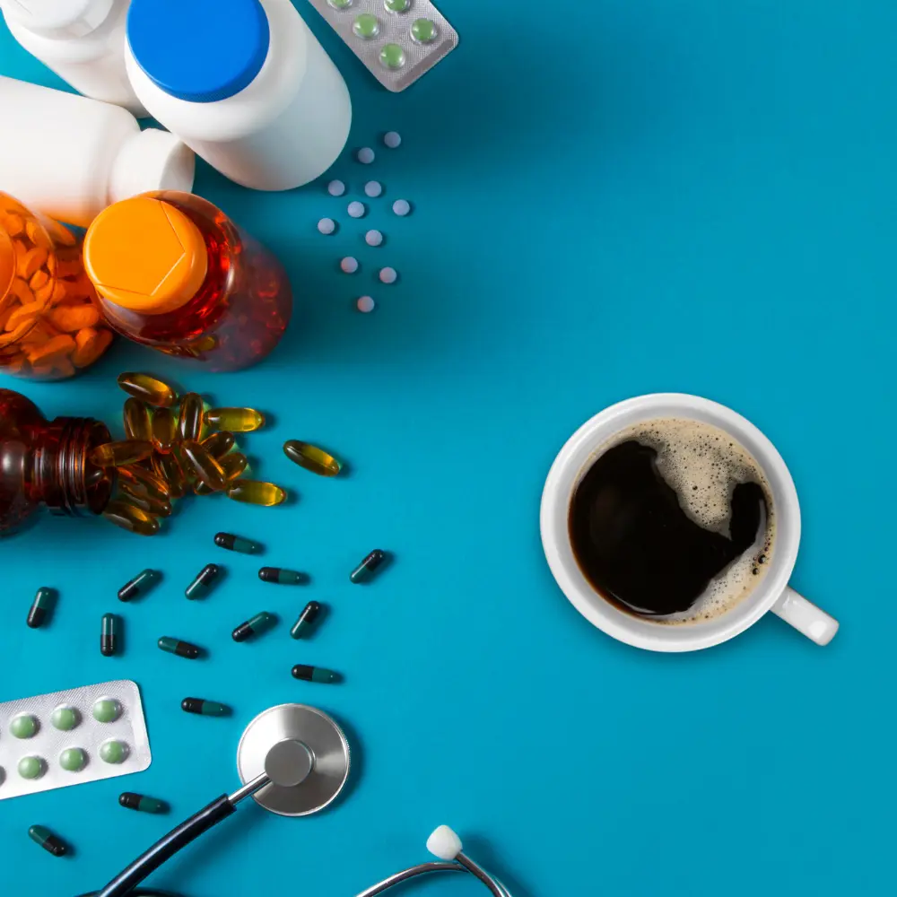 various meds and a cup of black coffee