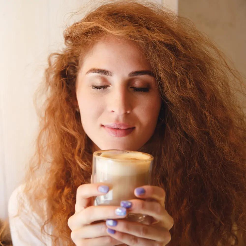 woman enjoying coffee