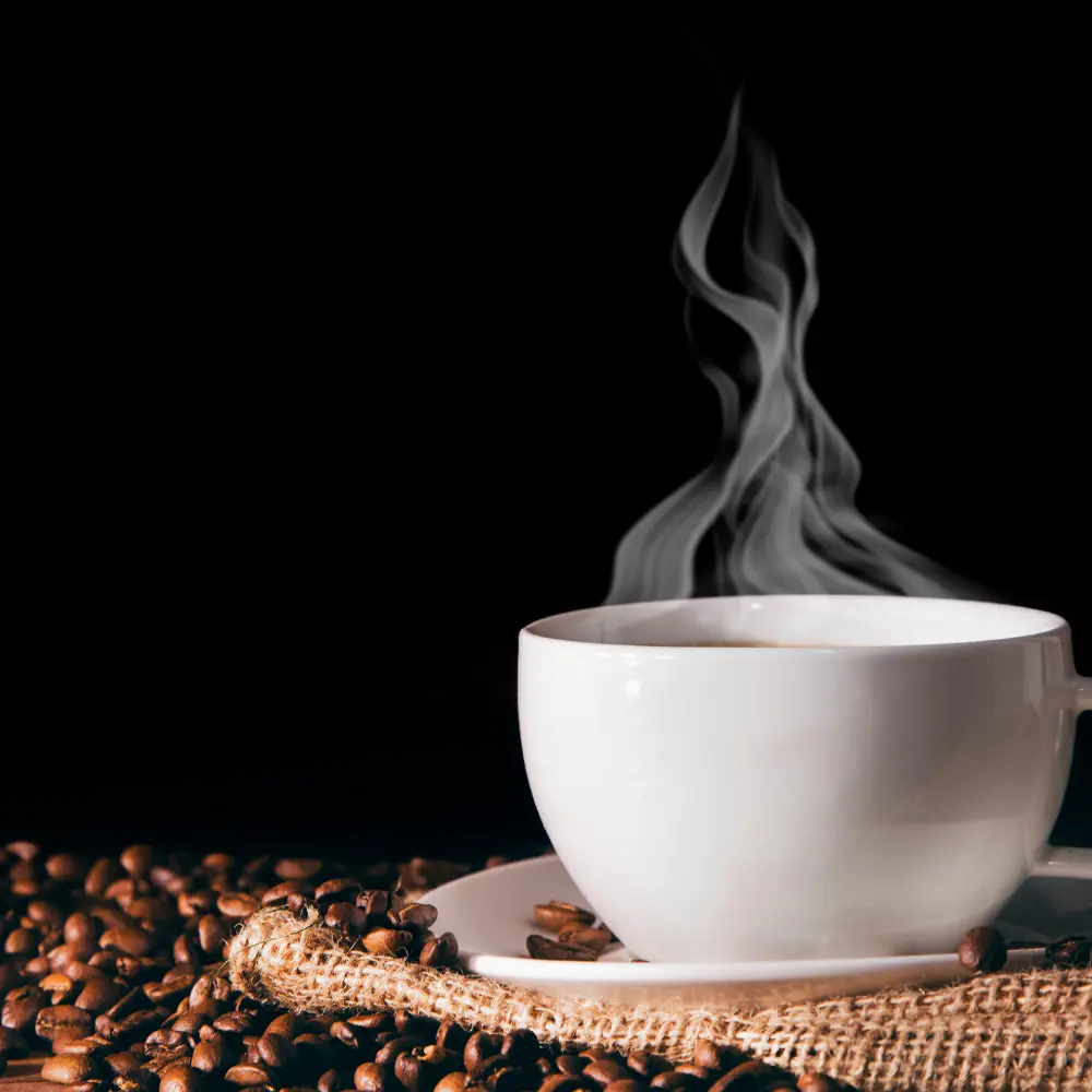 a steaming cup of coffee