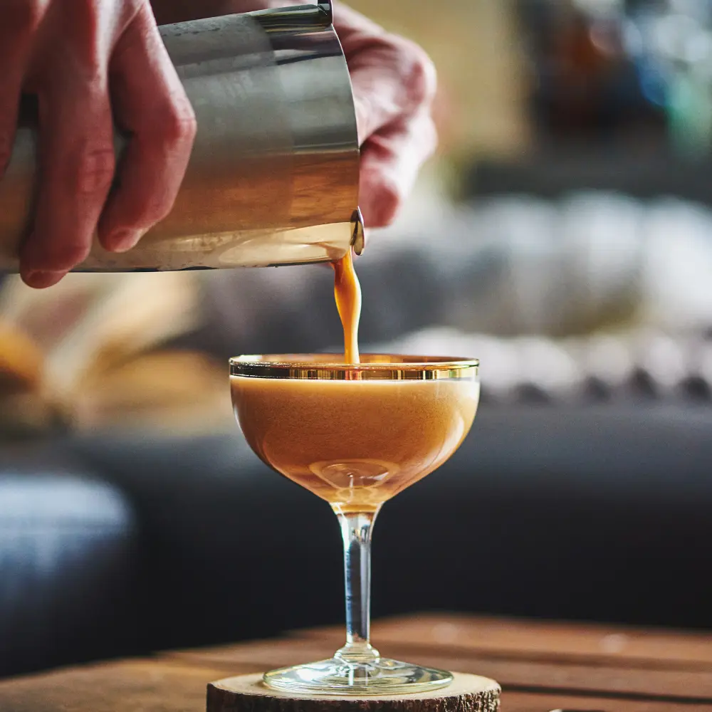 barista making a caffe shakerato