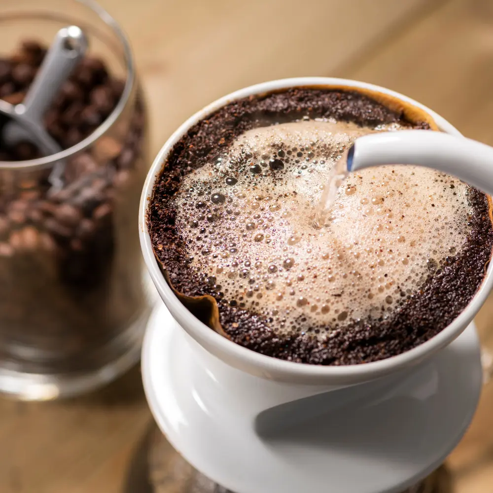 coffee bloom during pour over in a size 2 filter
