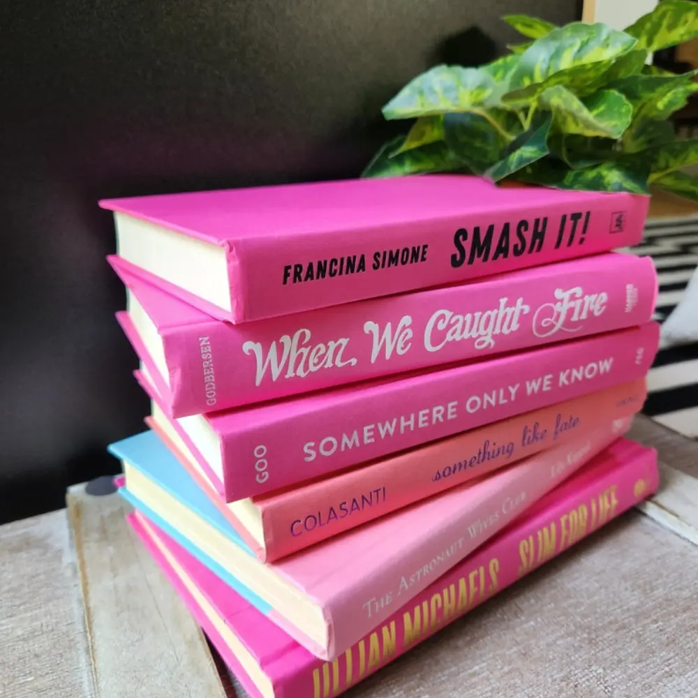 stack of pink books