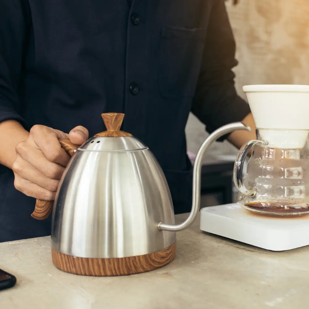 barista troubleshooting a kettle