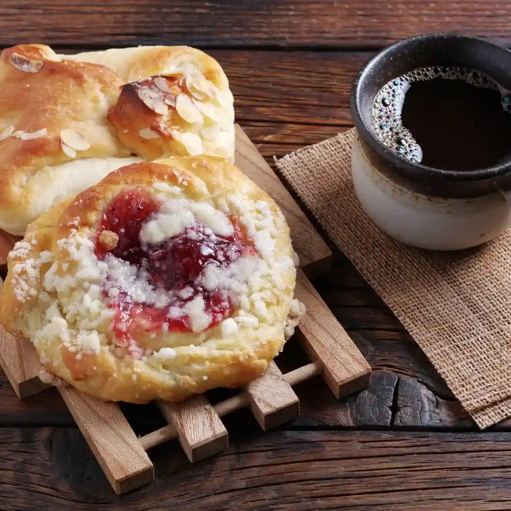 danish next to a coffee