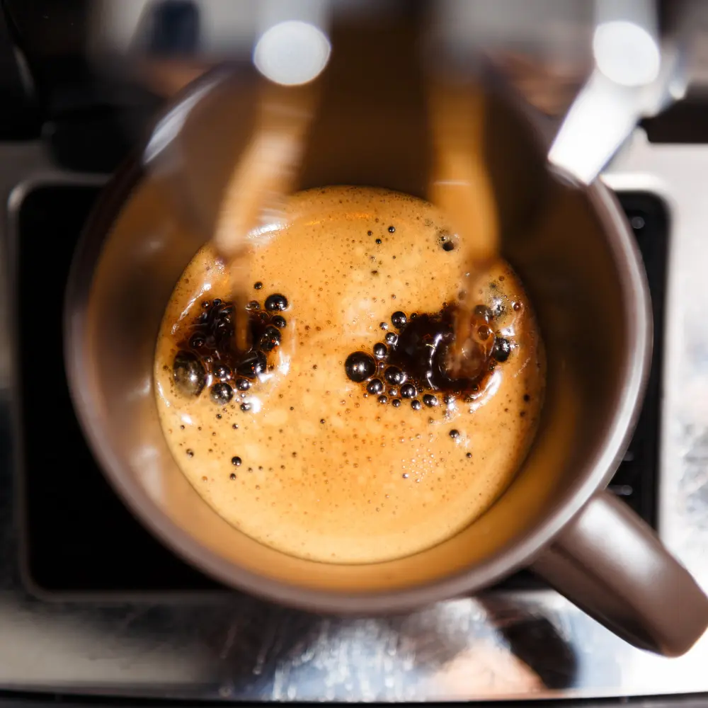 freshly brewed espresso via machine