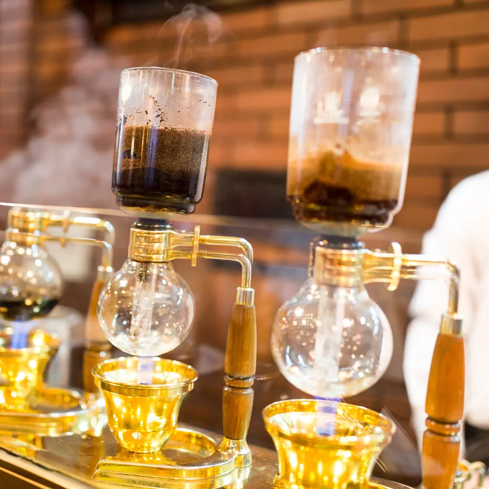 two siphon coffee makers at a cafe