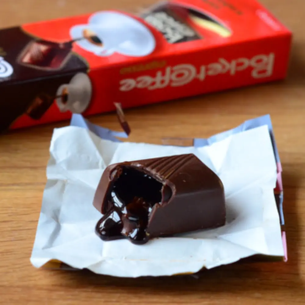 bitten pocket coffee with espresso oozing out