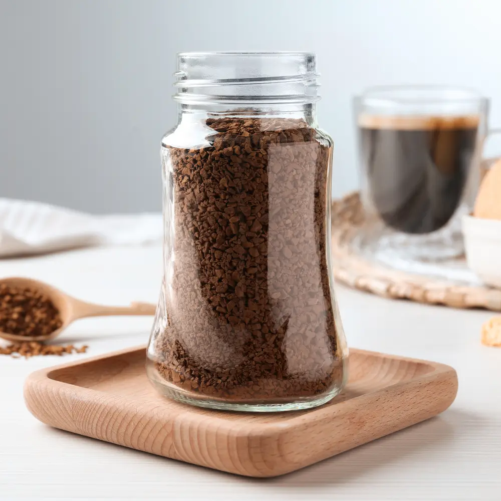 a glass jar of instant coffee