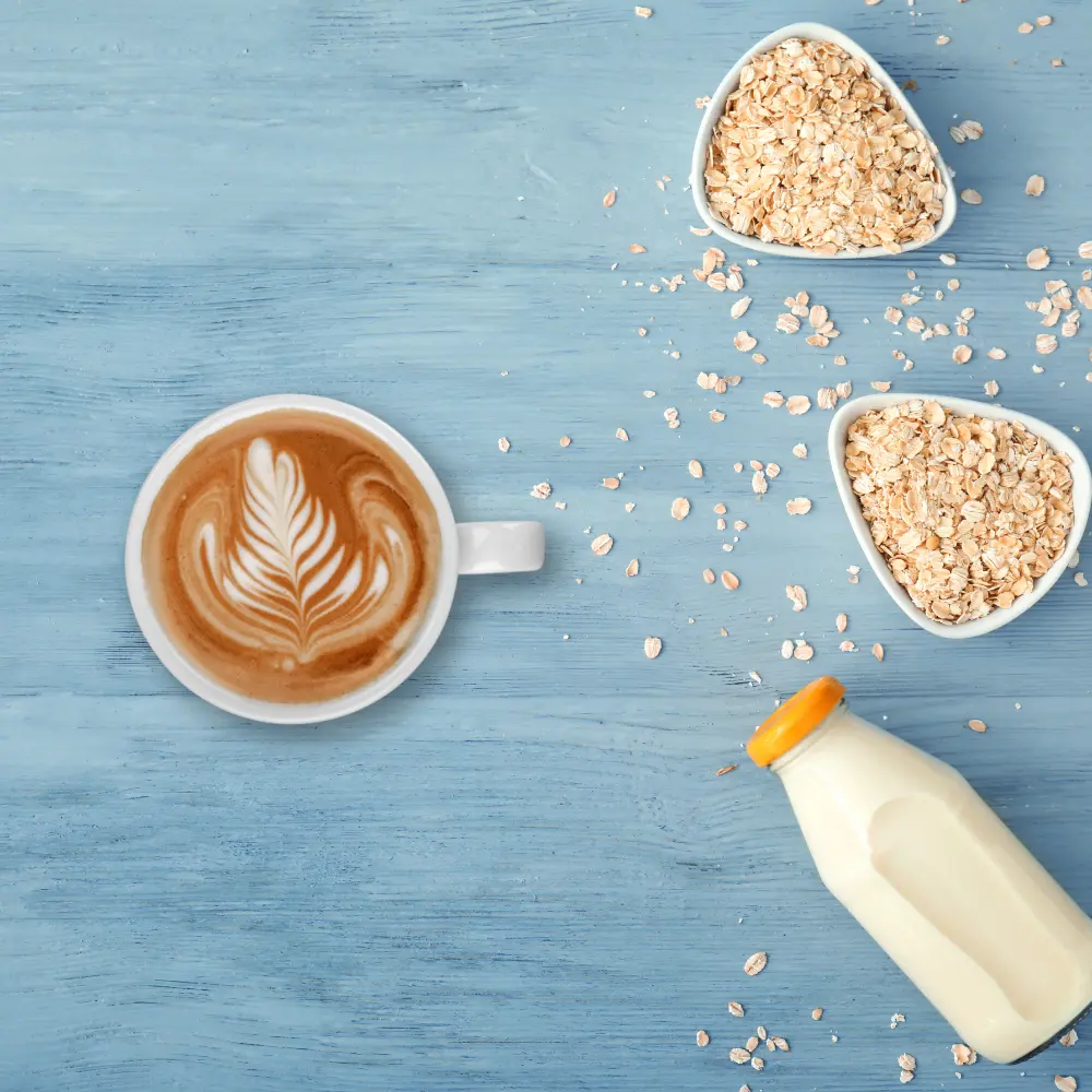 latte with oats in bowls and milk