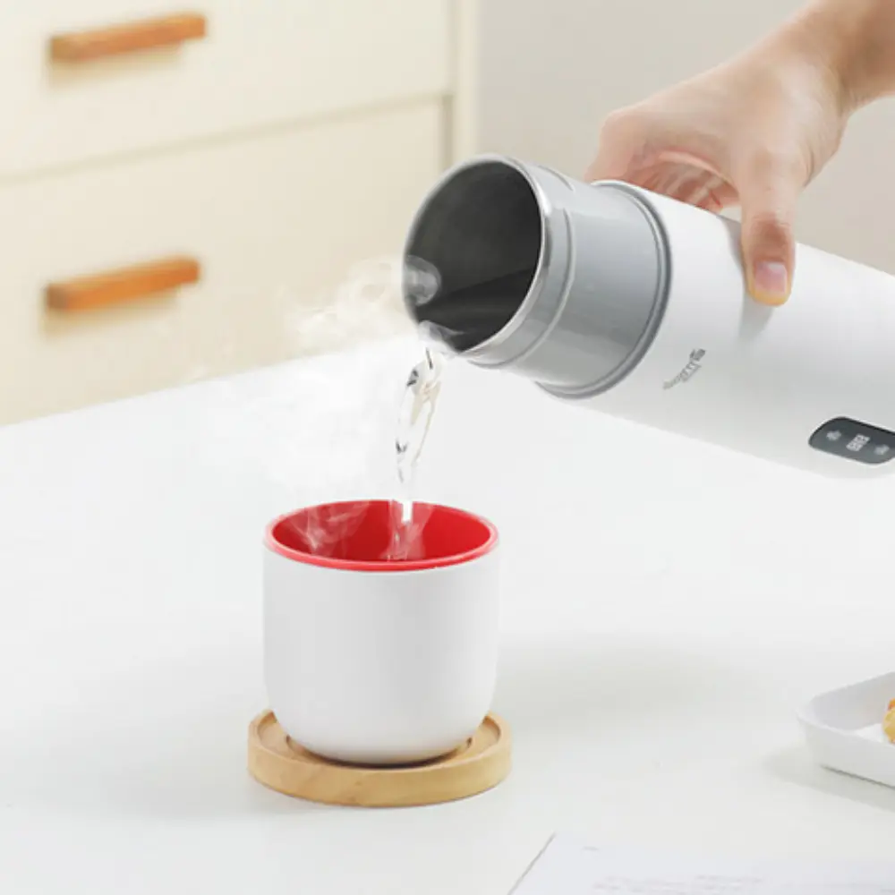 a thermos pouring hot water