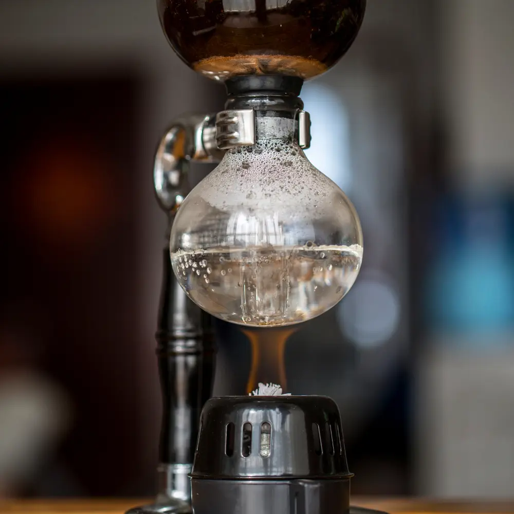 water boiling in a siphon coffee brewer
