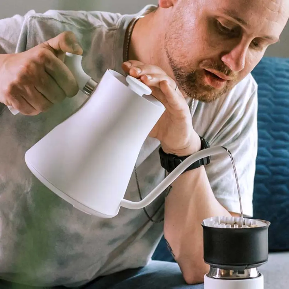 barista using the fellow stagg ekg gooseneck kettle
