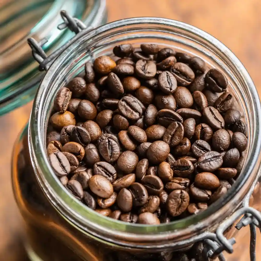 coffee beans stored in a mason jar