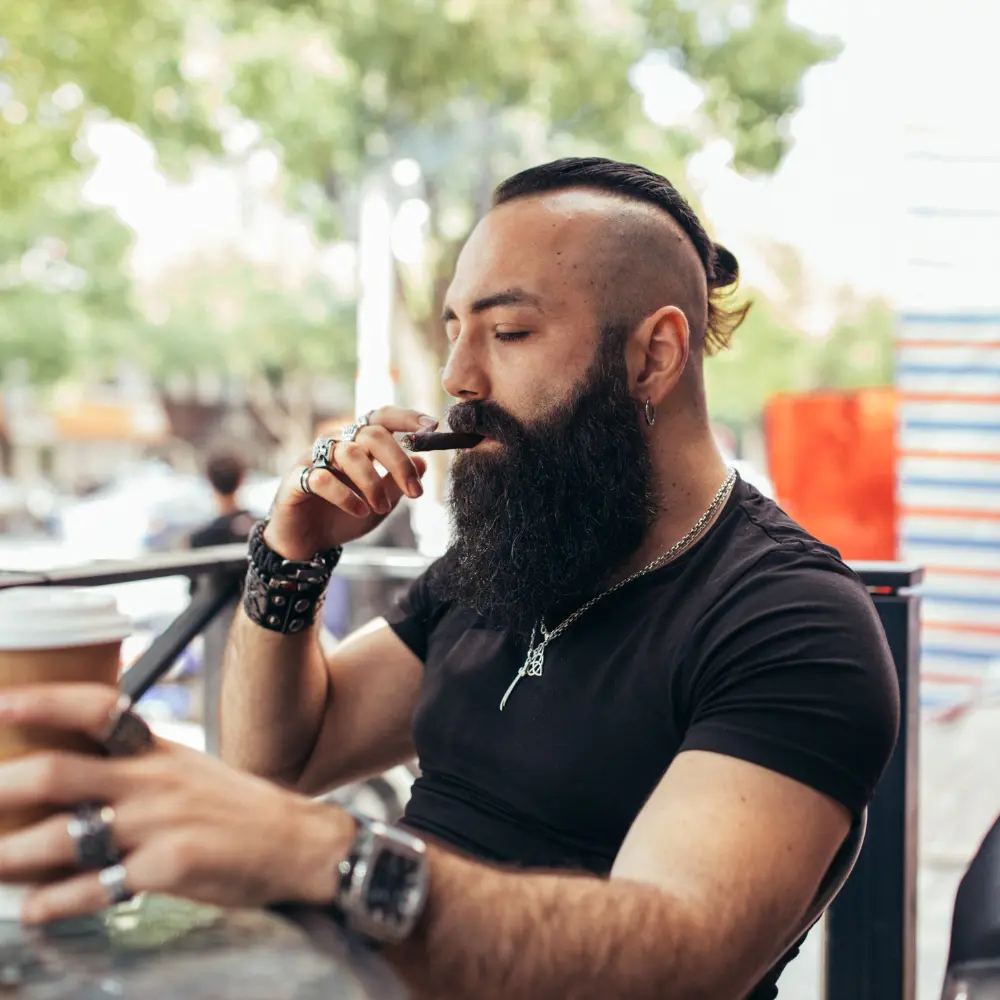 woman smoking inside her room