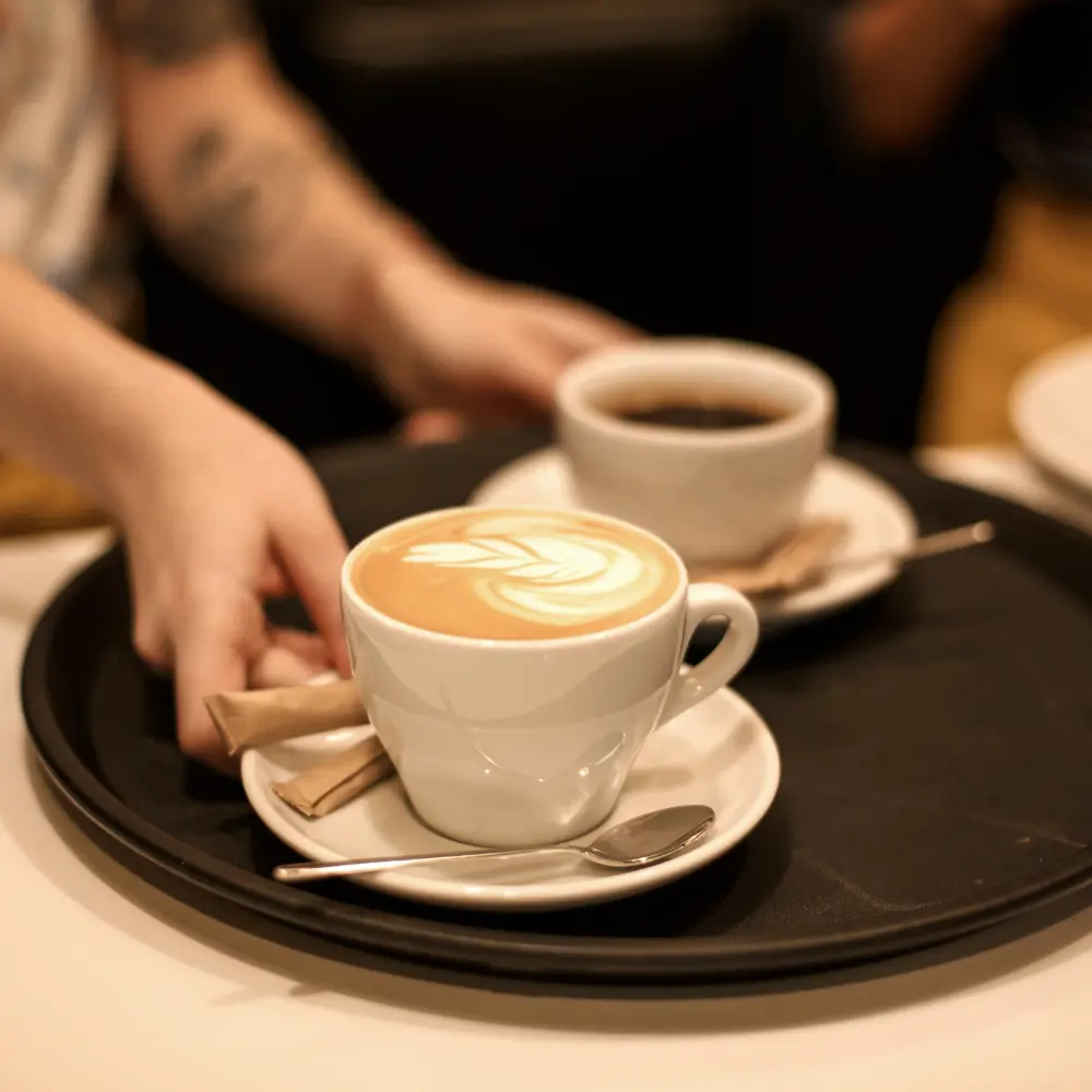 americano and latte served on a tray