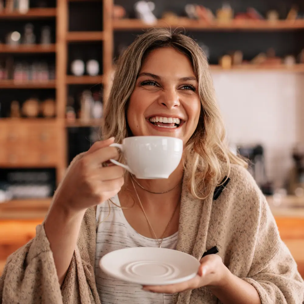 woman enjoying her coffee