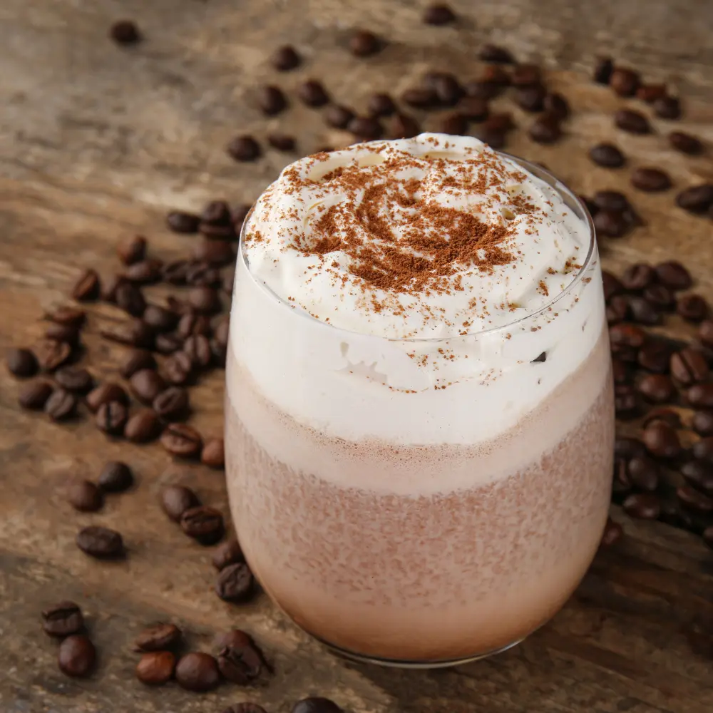 coffee drink with foam and chocolate toppings