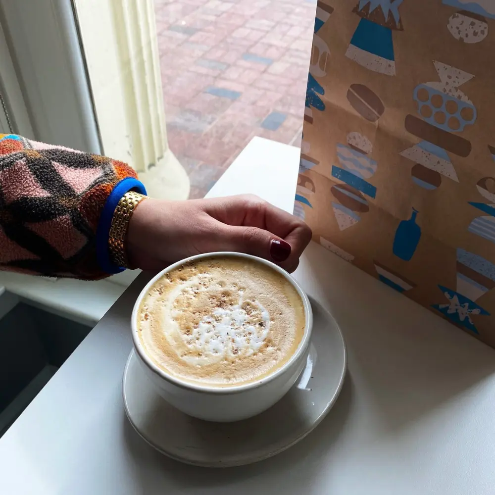 person enjoying a latte