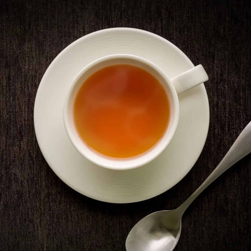 a cup of tea on a saucer