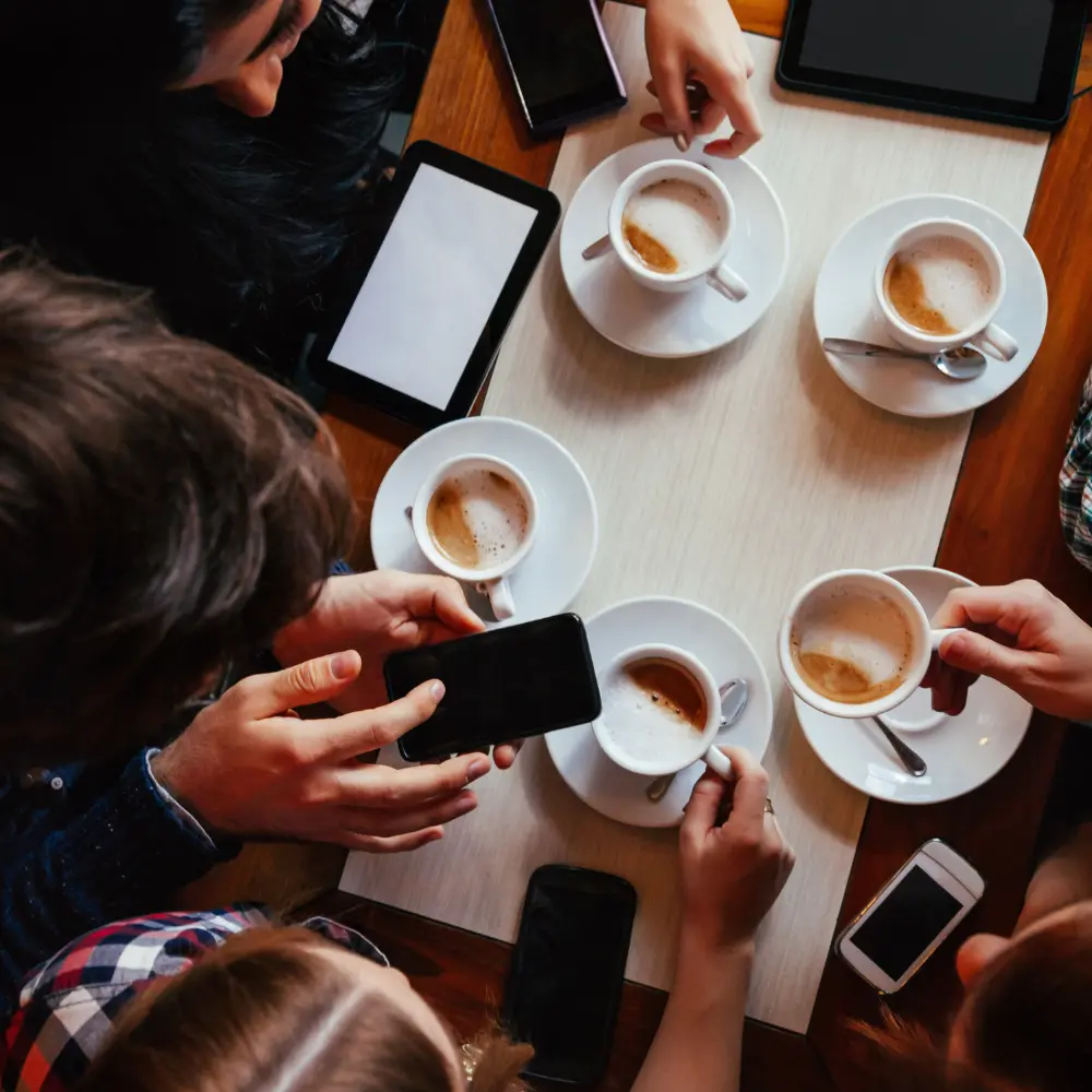various people enjoying coffee
