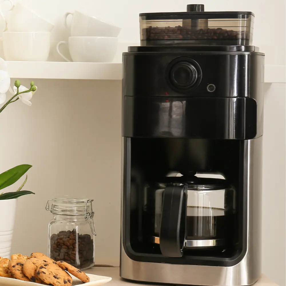 a modern coffee maker brewing tea