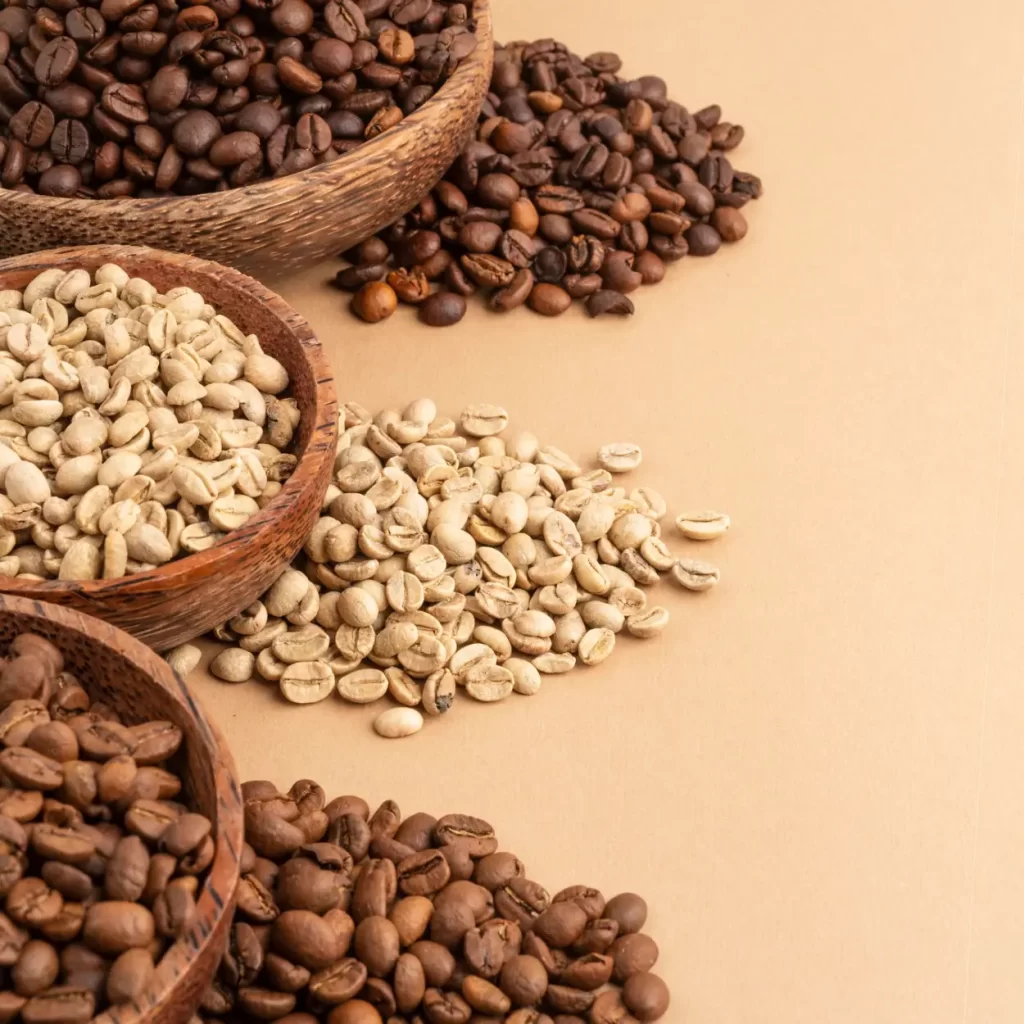 various bowls of coffee beans in different roasts