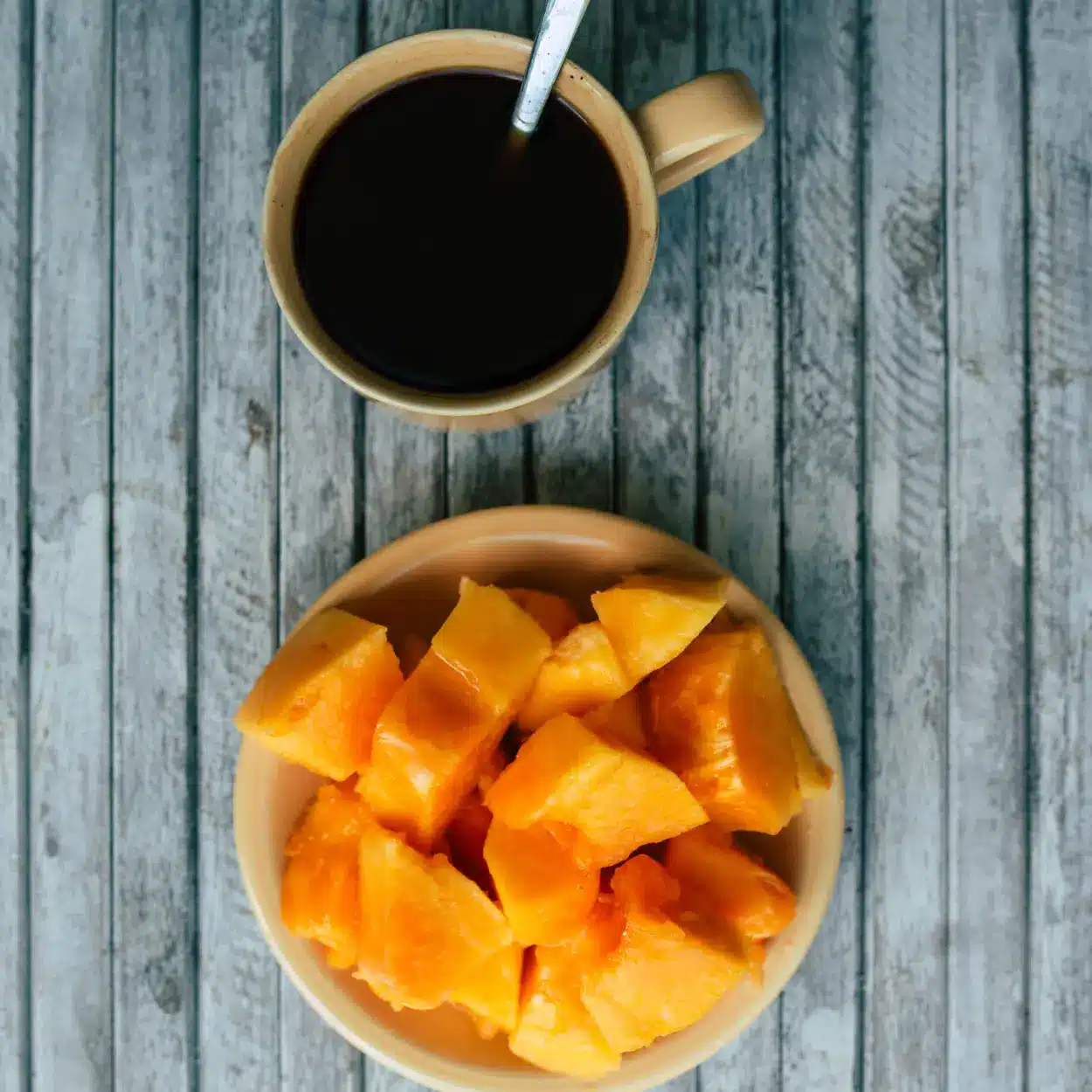 cut papaya and coffee