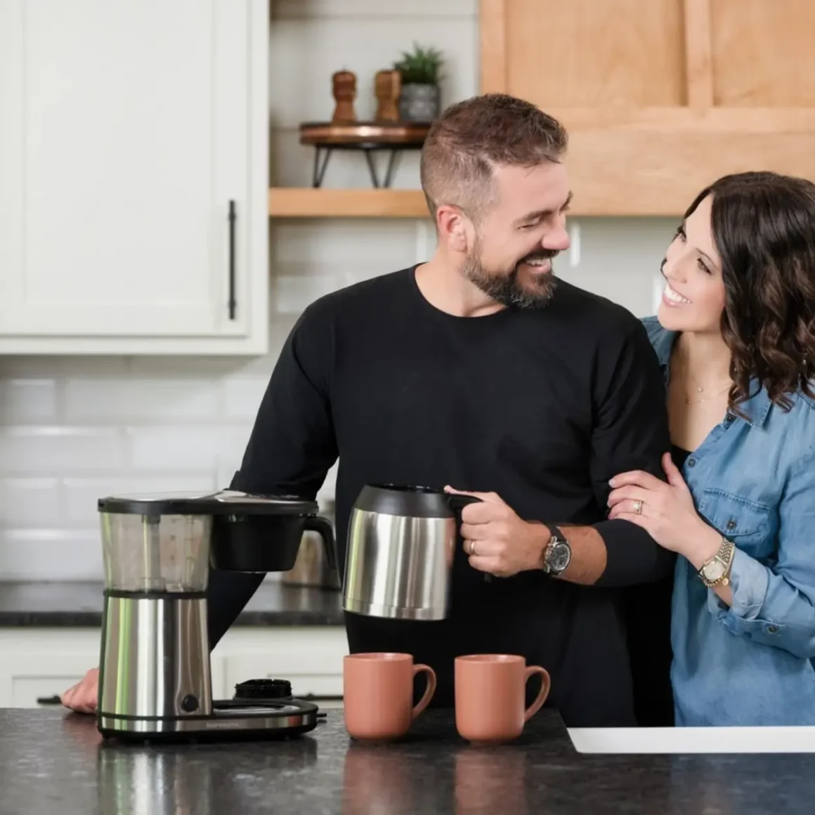 couple enjoying the bonavita 8 cup coffee maker
