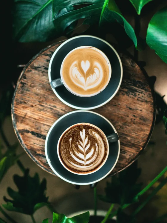 two cups of coffee on a table