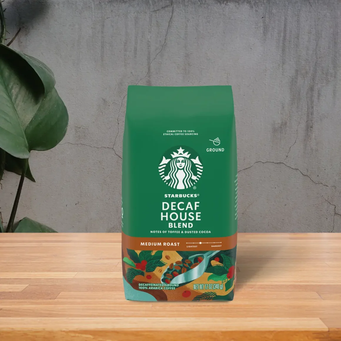 a bag of starbucks meduim dark roast decaf ground coffee on a table
