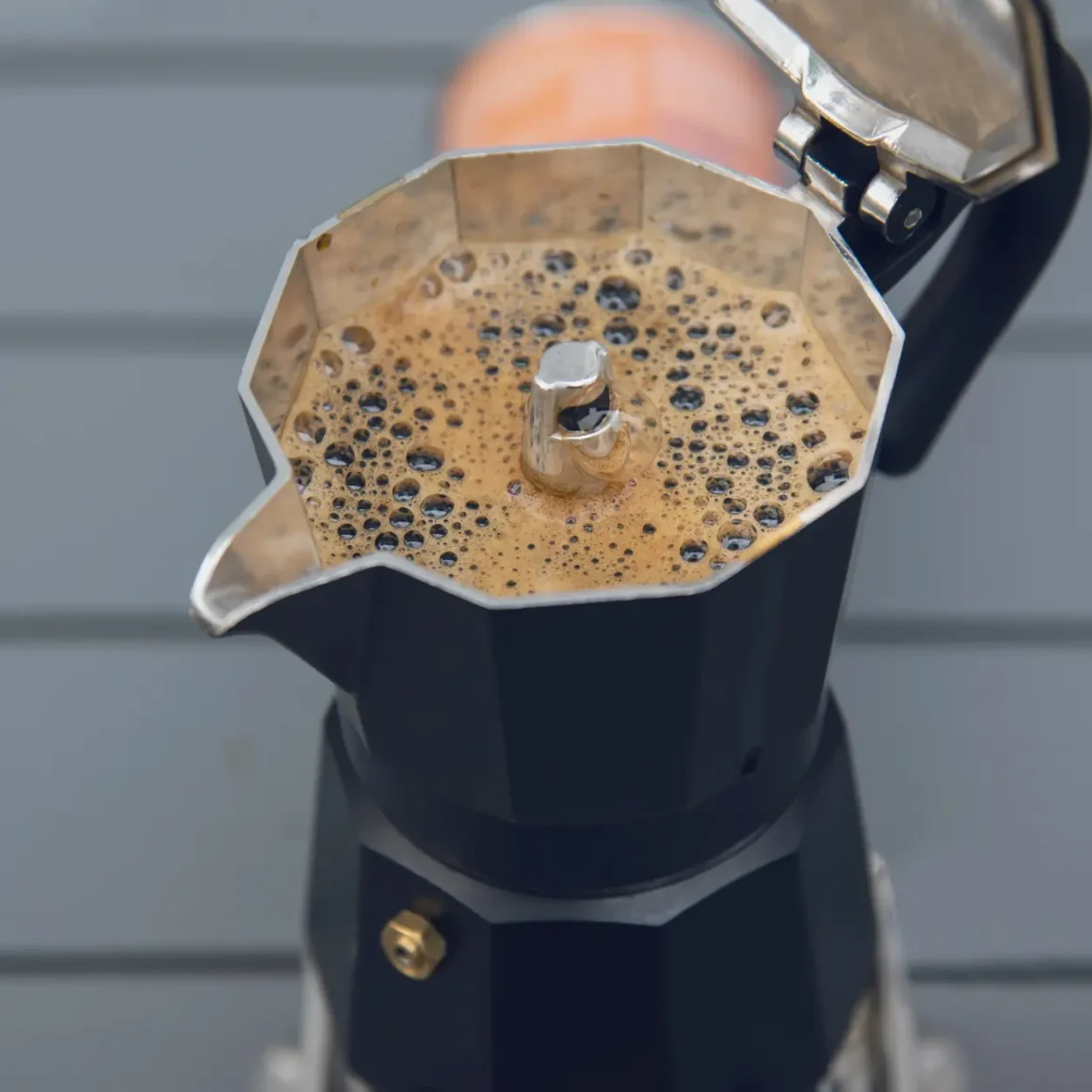 brewing coffee in a moka pot