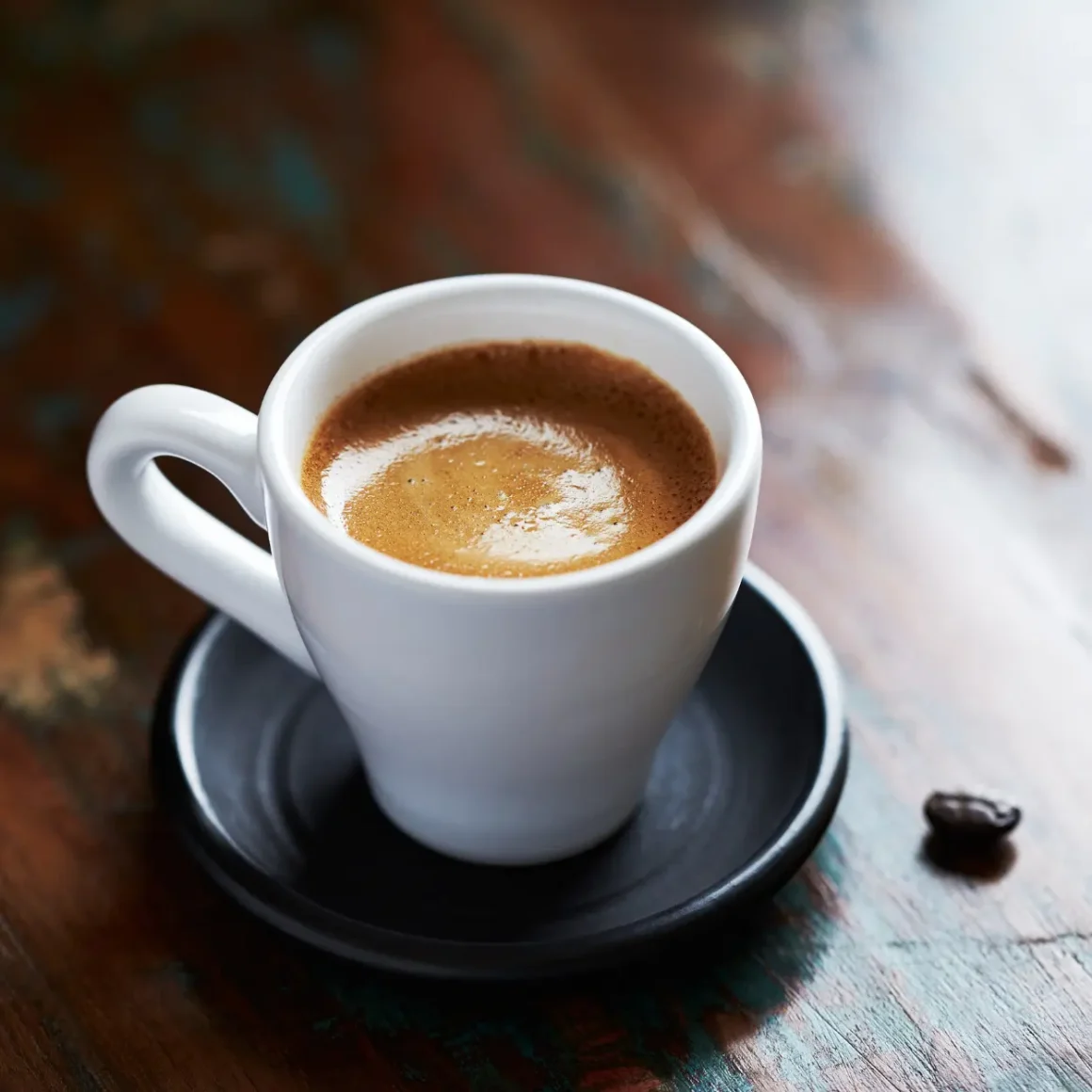 a cup of coffee on a saucer