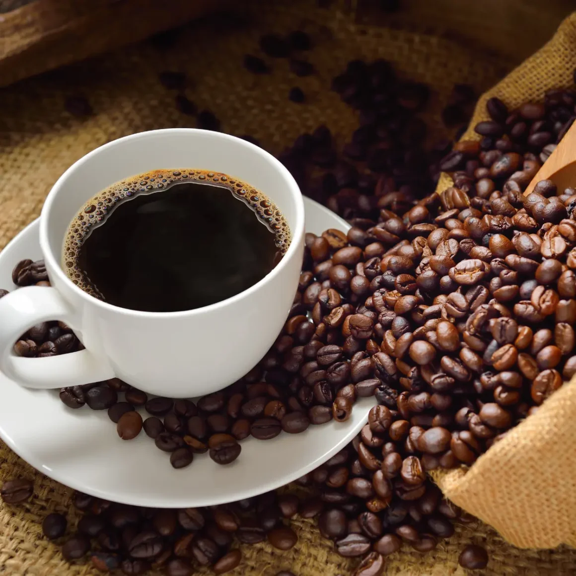 a cup of batian coffee and a bag of coffee beans